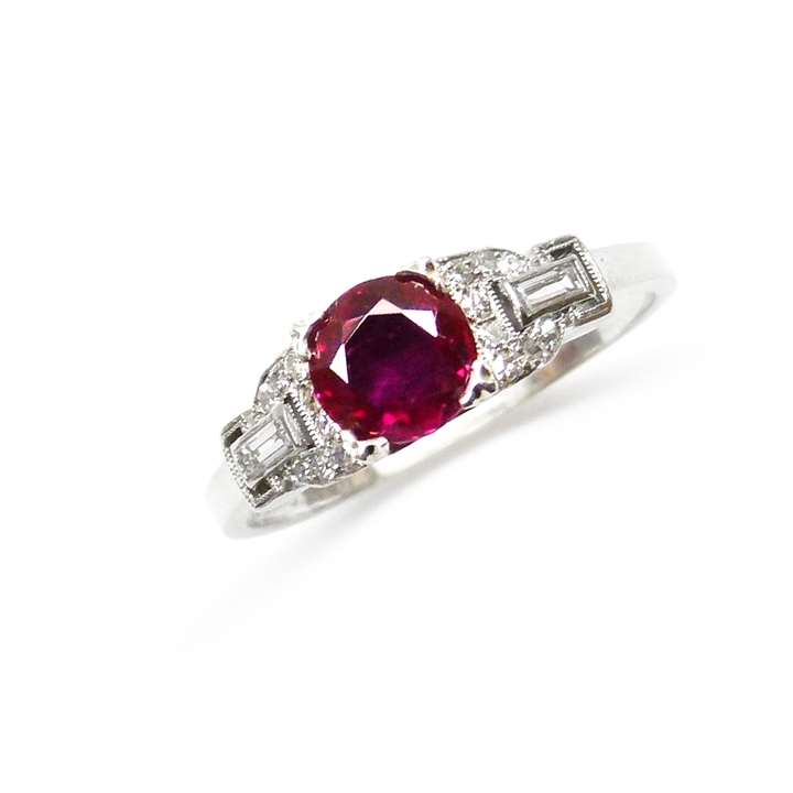 Single stone ruby and diamond ring, centred by a round cut Burma ruby